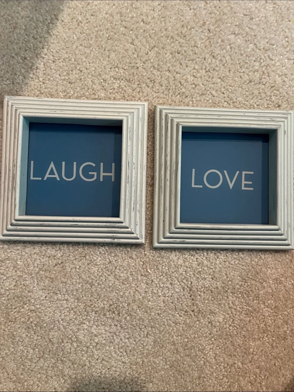 'Laugh' and 'Love' Plastic Frames